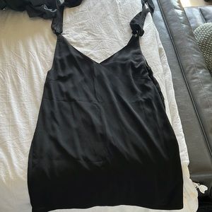 Short black dress w V neck. Babydoll fit.